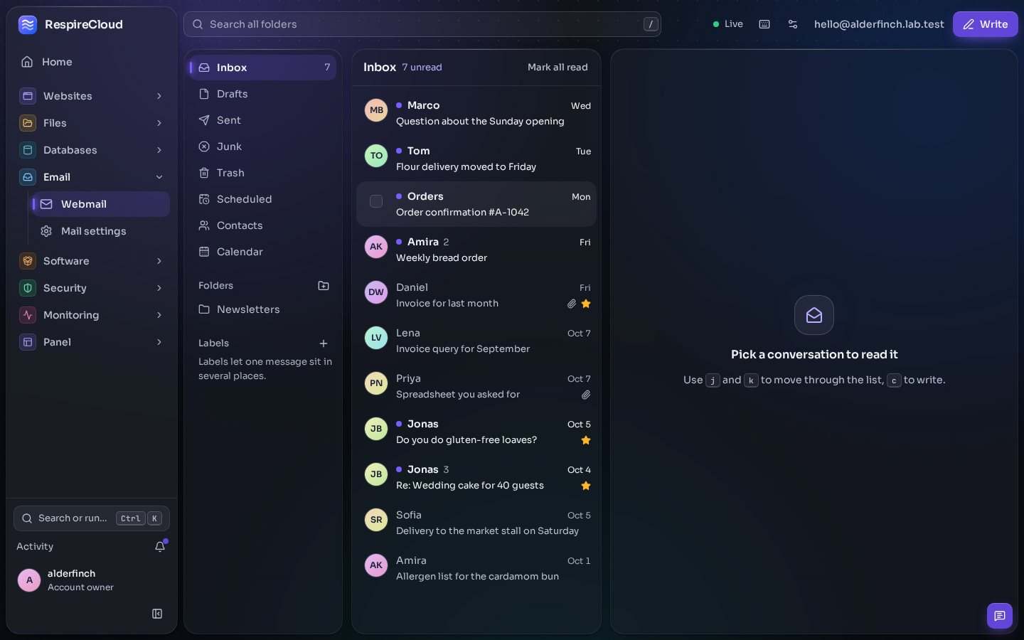 Webmail for one mailbox: folders on the left, a conversation list in the middle with unread marks, stars and attachment clips, and a Write button above.