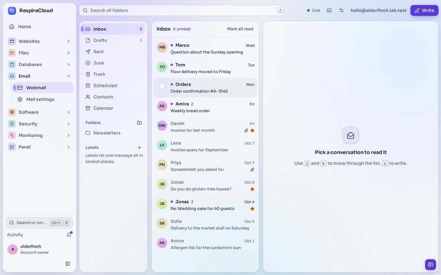 Webmail for one mailbox: folders on the left, a conversation list in the middle with unread marks, stars and attachment clips, and a Write button above.